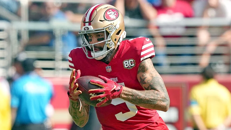49ers' Mike Evans battles through rib injury in gritty win over Broncos ...